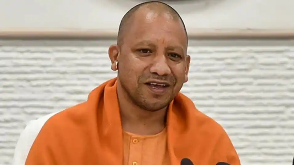 yogi adityanath extends free ration scheme in up