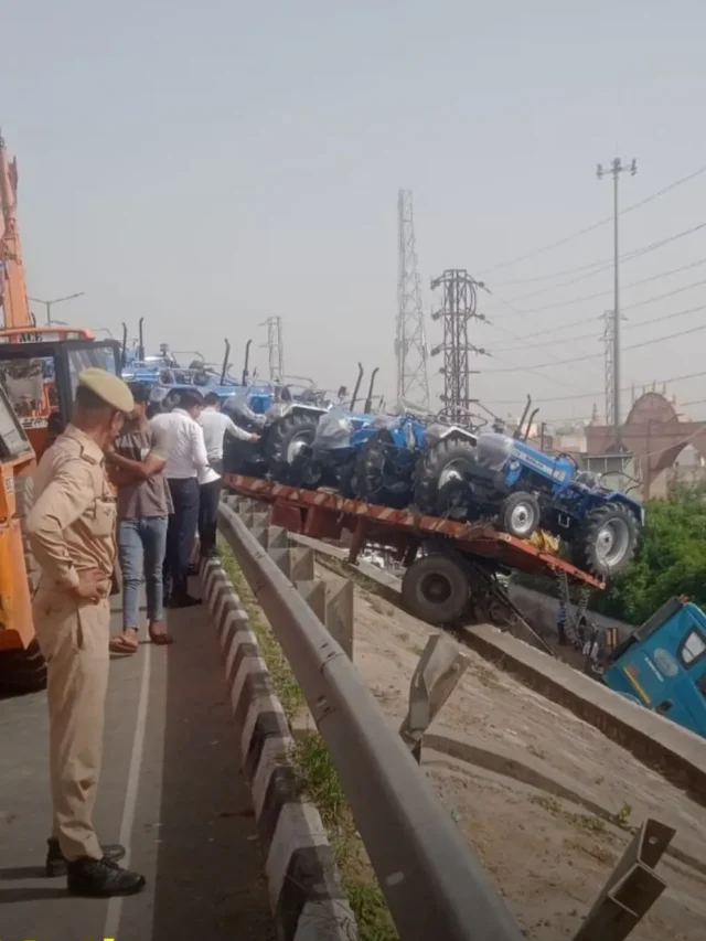 Trolley Loaded with Tractors Left Dangling in Mid-Air After Smashing Through Bridge Railing Near Gokul Restaurant