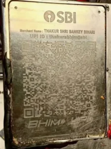 QR codes placed on donation boxes at Banke Bihari Temple