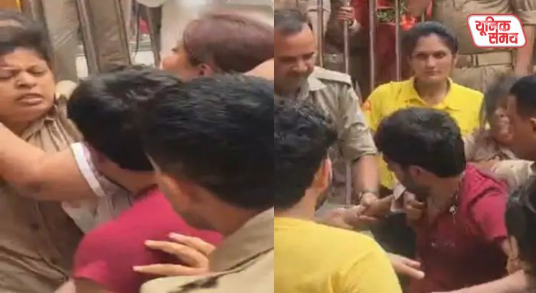 Female police officer rained slaps on a young male devotee