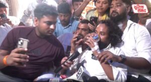 Student leader Devendra Mahto drank water after speaking with Sonam Wangchuk