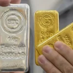 Record drop in gold and silver prices